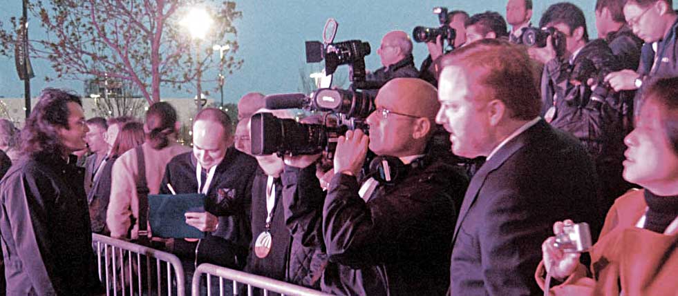Press gathered from across the globe to report on the painting